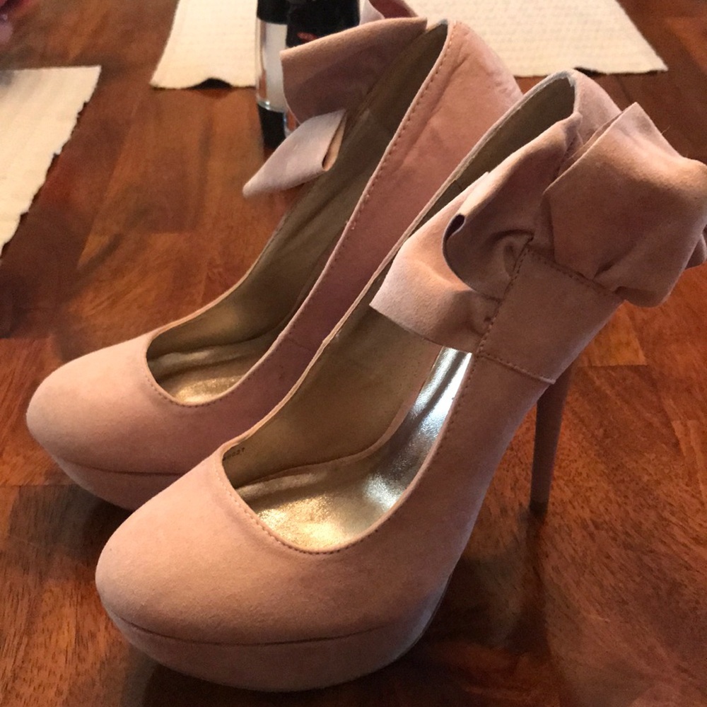 5 inch platform heels. Size 8. Never worn!